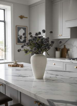 Luxury grey coloured real touch faux pompom flowers styled in a matte ceramic vase on a marble kitchen island #grey