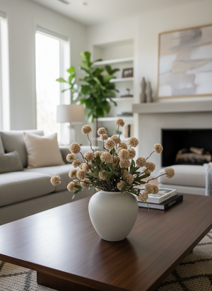 Beige real touch faux pompom flowers styled in a matte ceramic vase on a modern coffee table in a neutral living space #beige