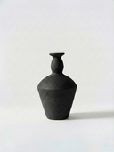 Minimalist black vase on a white background