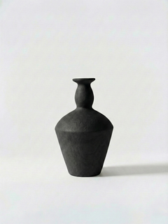Minimalist black vase on a white background