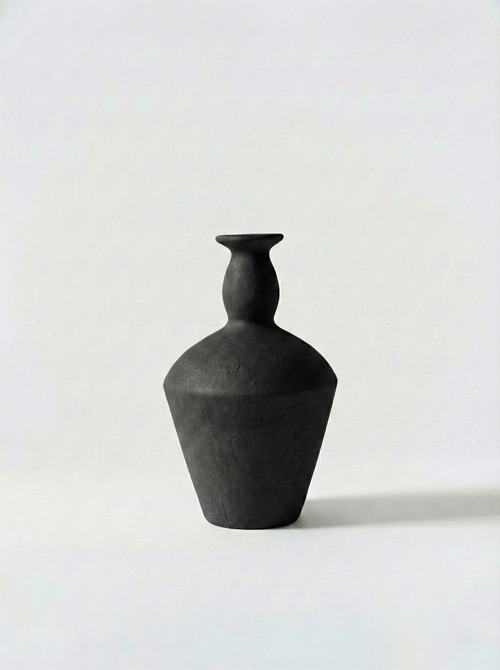 Minimalist black vase on a white background