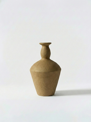 Minimalist brown ceramic vase on a white background