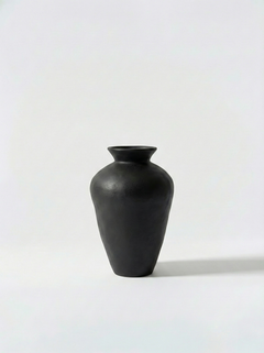 Minimalist black vase on a white background