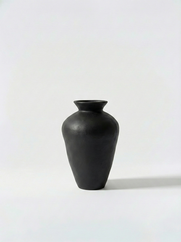 Minimalist black vase on a white background