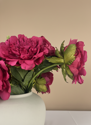 Detailed view of realistic fuchsia pink artificial peonies with soft layered petals #fuchsia-pink