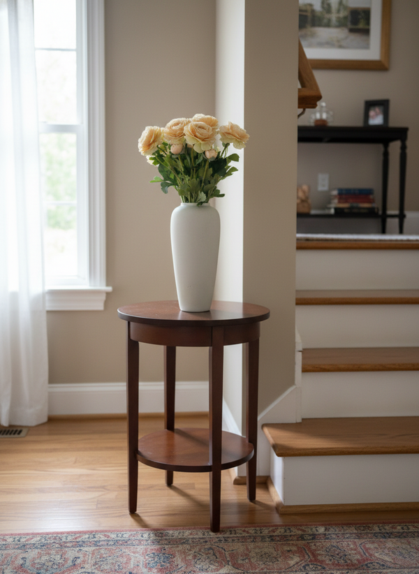 Tall faux peach ranunculus with natural green stems in a white ceramic vase, styled for a refined hallway #soft-peach