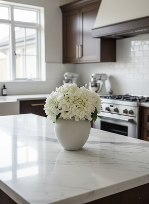 Elegant white artificial hydrangea arrangement on marble kitchen bench top #white