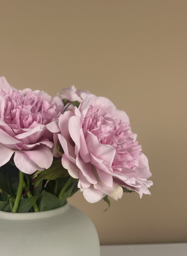 Detailed view of realistic pink artificial peonies with soft layered petals #baby-pink