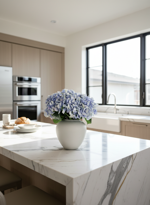 Elegant blue artificial hydrangea arrangement on marble kitchen bench top #periwinkle-blue