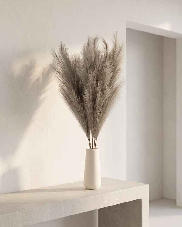 Premium brown faux pampas grass bouquet in a minimalist white ceramic vase on a concrete table #light-brown 