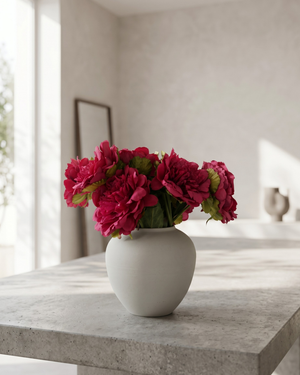 Realistic faux fuchsia pink peonies in contemporary ceramic vase for home styling #fuchsia-pink