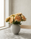 Realistic faux yellow peonies in contemporary ceramic vase for home styling #yellow