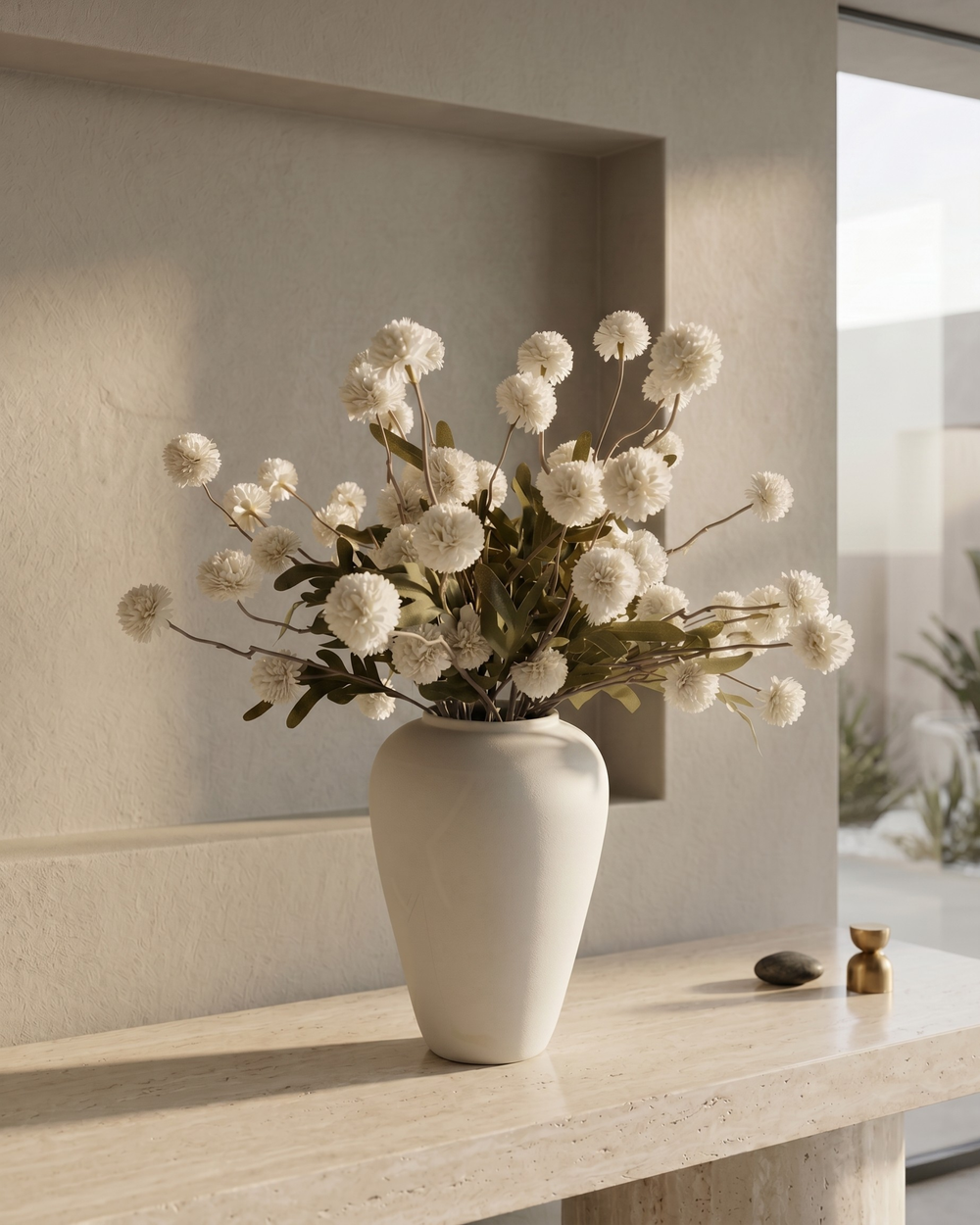 White vase with whitereal touch faux pompon  flowers on a light wooden surface #white