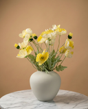 Real touch faux yellow poppy arrangement in a ceramic vase, styled on a marble table for modern home décor #yellow