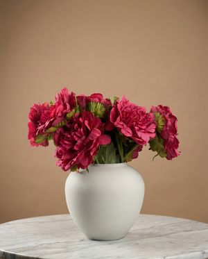 Realistic faux fuchsia pink peonies in contemporary ceramic vase for home styling #fuchsia-pink