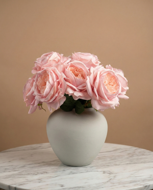 Real touch faux pink rose arrangement with soft layered blooms styled in a matte ceramic vase on a marble table #pink