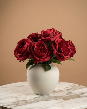 Real touch faux red rose arrangement with soft layered blooms styled in a matte ceramic vase on a marble table #red