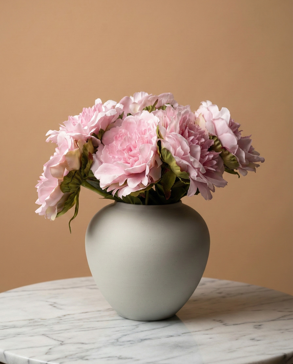 Realistic faux pink peonies in contemporary ceramic vase for home styling #baby-pink