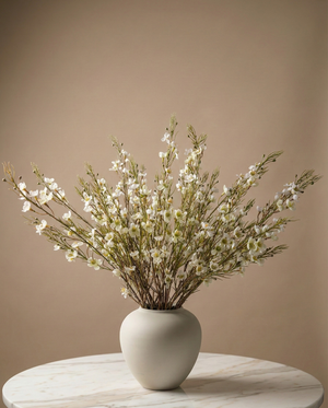 Real touch white faux wax flower arrangement with delicate blooms in a matte white ceramic vase for modern home decor #white
