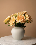 Realistic faux yellow peonies in contemporary ceramic vase for home styling #yellow