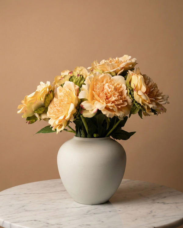 Realistic faux yellow peonies in contemporary ceramic vase for home styling #yellow