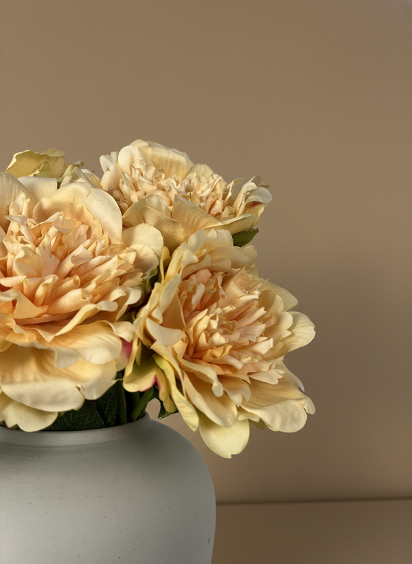 Detailed view of realistic yellow artificial peonies with soft layered petals #yellow