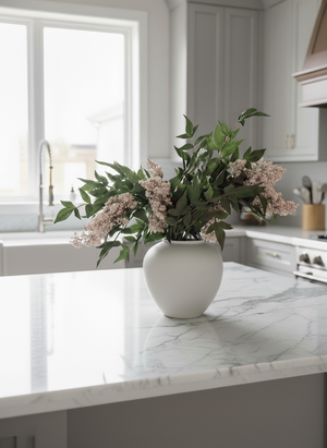 Artificial pink berry and greenery arrangement in a white ceramic vase for modern kitchen decor #pale-pink