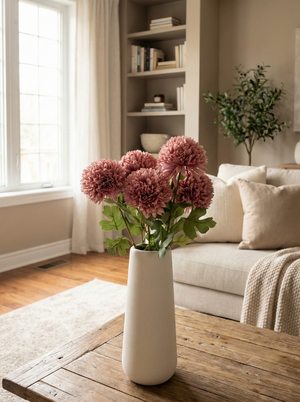 Blush pink faux pompom flowers in brown ceramic vase on wooden coffee table, modern artificial floral home decor #blush-pink