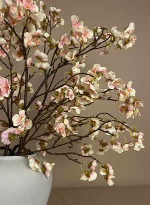Close-up of pink faux cherry blossom branches in ceramic vase, realistic artificial flowers for modern home decor #blush-pink