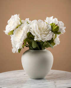 Realistic faux white peonies in contemporary ceramic vase for home styling #white